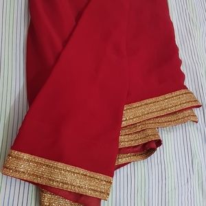 Red saree with golden border